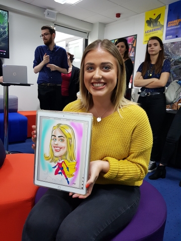 Drawing on a iPad at a corporate event in Mercedes-Benz office